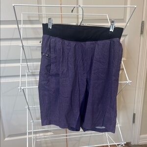 Lululemon Purple Athletic Shorts with Black Waistband and Relaxed Fit